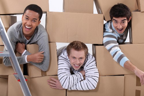 Packed furniture and boxes ready for renovation storage in Newbarnet