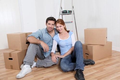 Student moving seasonal items into storage in Newbarnet