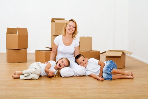 Packed moving boxes prepared for house removals in Newbarnet