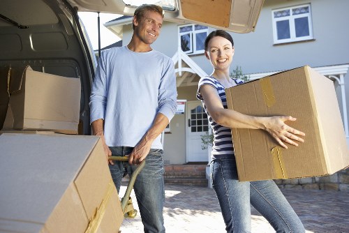 Packing boxes and furniture prepared for small removals service